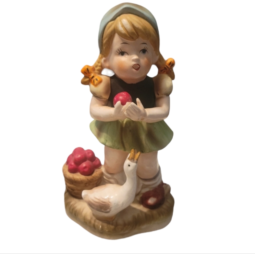 vintage girl with duck and apples Exclusively from Flambro.